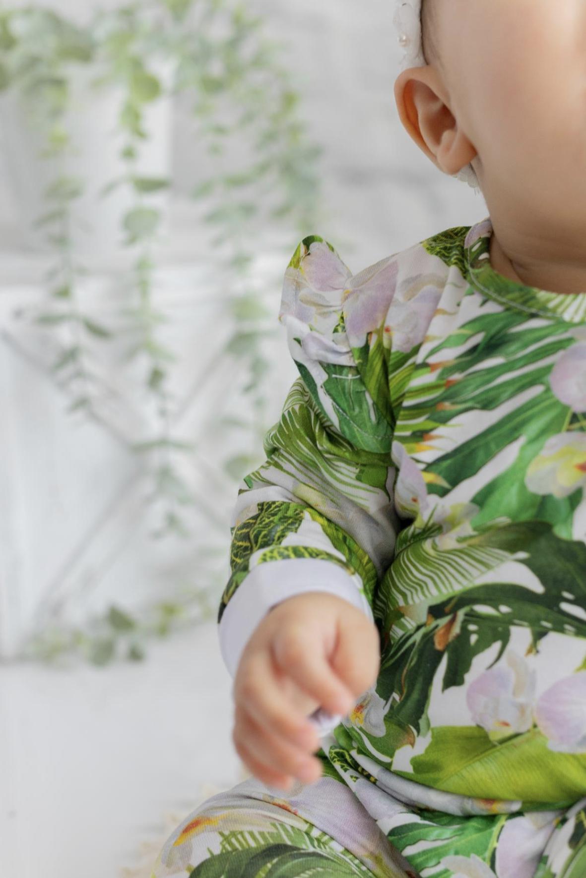 Orchid baby onesie