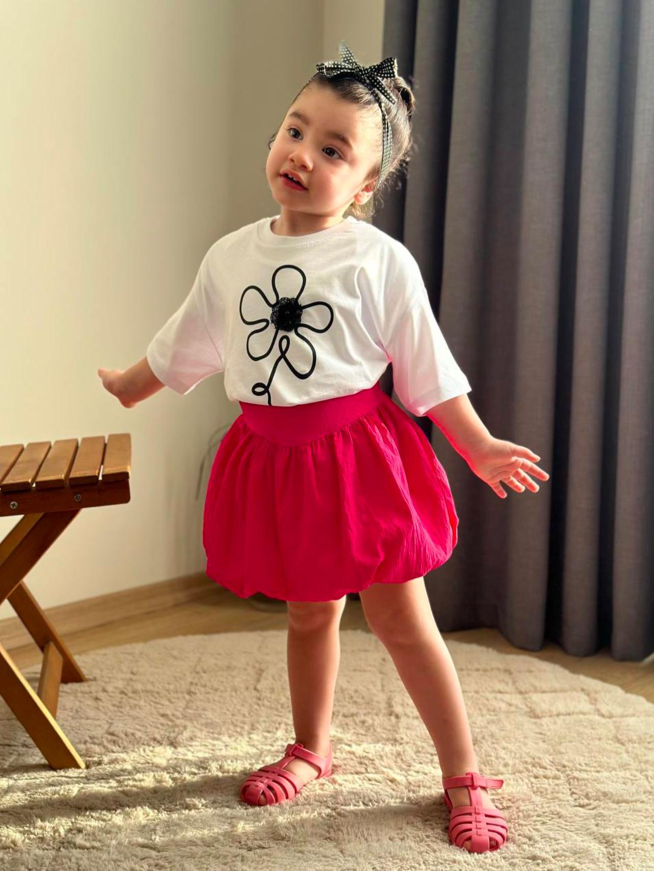 Girls White Tshirt with Black Flower and Fuchsia skirt
