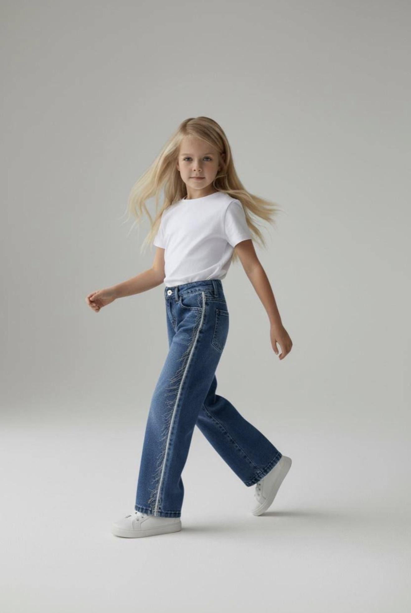 Girl blue jeans with frill