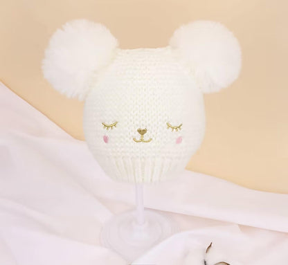 White Knit Baby Hat with pom poms