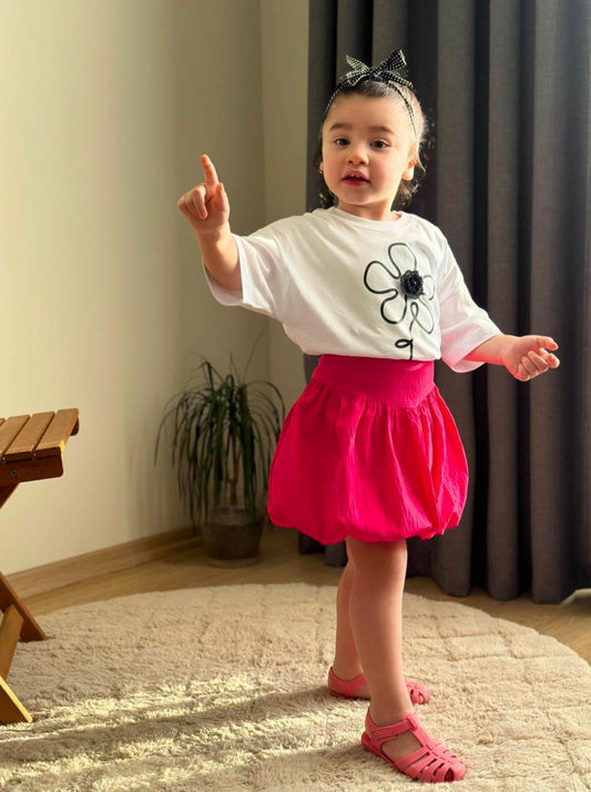 Girls White Tshirt with Black Flower and Fuchsia skirt